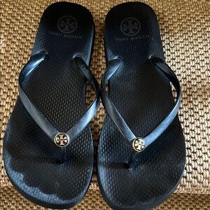 Tory Burch Black Flip Flops with Gold Logo